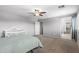 This spacious bedroom features neutral carpet, paint, and modern window shutters at 21288 E Via Del Sol --, Queen Creek, AZ 85142