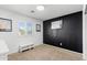Minimalist bedroom with modern design and a black accent wall at 21288 E Via Del Sol --, Queen Creek, AZ 85142