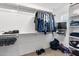 A large walk-in closet with custom shelving, ample hanging space, and a window for natural light at 21288 E Via Del Sol --, Queen Creek, AZ 85142
