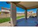 This outdoor patio features paver flooring, large support beams, and views of the expansive backyard at 21288 E Via Del Sol --, Queen Creek, AZ 85142
