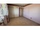 Bedroom with sliding closet doors, tile flooring, and neutral walls with floral trim at 2137 W Del Campo Cir, Mesa, AZ 85202