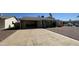 Single-story house with a long driveway and attached carport at 2137 W Del Campo Cir, Mesa, AZ 85202