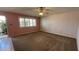 Spacious living room featuring a large window allowing for plenty of natural light at 2137 W Del Campo Cir, Mesa, AZ 85202