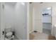 Bright bathroom with walk in shower, walk-in closet and neutral paint at 21595 S 225Th Way, Queen Creek, AZ 85142