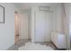 Cozy bedroom offers a plush rug, white trim and doors, and natural light at 21595 S 225Th Way, Queen Creek, AZ 85142