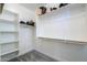 Spacious walk-in closet with ample shelving and clothing racks for organization at 21595 S 225Th Way, Queen Creek, AZ 85142