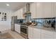 Kitchen featuring granite countertops, stainless steel appliances, and decorative backsplash at 21595 S 225Th Way, Queen Creek, AZ 85142