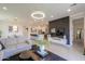 Spacious living room and dining room area in an open-concept floorplan at 21595 S 225Th Way, Queen Creek, AZ 85142