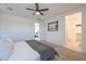 Bright main bedroom features soft carpet flooring and neutral paint at 21595 S 225Th Way, Queen Creek, AZ 85142