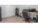 Bedroom features tile floors, neutral walls, large closet, and window with blinds at 21950 N Dietz Dr, Maricopa, AZ 85138