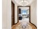 Foyer leading to an office space, showcasing decorative tile flooring at 2211 E Camelback Rd # 1203, Phoenix, AZ 85016