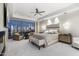Elegant main bedroom with comfortable chairs, large windows, and stylish decor at 2211 E Camelback Rd # 1203, Phoenix, AZ 85016