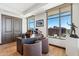 Bright and airy office with hardwood floors, large windows, and designer furnishings at 2211 E Camelback Rd # 1203, Phoenix, AZ 85016