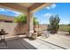 Comfortable back patio with desert landscaping, great for outdoor living at 22231 N 51St St, Phoenix, AZ 85054