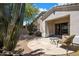 Comfortable back patio with desert landscaping and easy access to indoor living spaces at 22231 N 51St St, Phoenix, AZ 85054