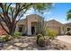Inviting home with desert landscaping, mature trees, and a well-maintained front yard at 22231 N 51St St, Phoenix, AZ 85054