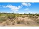 Expansive view of the community golf course surrounded by desert vegetation and mountains at 22231 N 51St St, Phoenix, AZ 85054