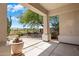 Relaxing covered patio area with desert landscaping, stone flooring and scenic views at 22231 N 51St St, Phoenix, AZ 85054
