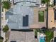 Aerial view of a home with solar panels, pool, and backyard putting green at 23451 S 228Th St, Queen Creek, AZ 85142