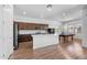 Open-concept kitchen with stainless steel appliances, a large island, and ample cabinet space at 23451 S 228Th St, Queen Creek, AZ 85142
