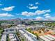 Expansive aerial view showcasing the apartment's surrounding urban landscape with striking mountain views on a clear, sunny day at 2300 E Campbell Ave # 104, Phoenix, AZ 85016