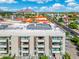 Stunning exterior view of the multi-Gathering home featuring private balconies, modern design, and vibrant surroundings at 2300 E Campbell Ave # 104, Phoenix, AZ 85016