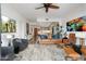 Stylish living room with a comfortable seating arrangement and plenty of natural light at 2300 E Campbell Ave # 104, Phoenix, AZ 85016