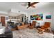 Open-concept living area with view of the kitchen and a comfortable seating arrangement at 2300 E Campbell Ave # 104, Phoenix, AZ 85016