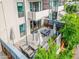 Expansive patio with a dining area, lounge furniture, and privacy features, perfect for outdoor living at 2300 E Campbell Ave # 104, Phoenix, AZ 85016