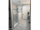 Modern bathroom featuring a glass enclosed shower with stylish tile work and updated fixtures at 233 W Sweet Shrub Ave, San Tan Valley, AZ 85140