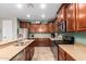 A well-appointed kitchen features stainless steel appliances and generous counter space at 233 W Sweet Shrub Ave, San Tan Valley, AZ 85140