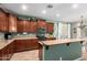 Spacious kitchen with a large island, stainless steel appliances, and ample cabinet space at 233 W Sweet Shrub Ave, San Tan Valley, AZ 85140