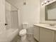 Bathroom featuring vanity with white countertop, framed mirror, and shower-tub combo at 2333 E Southern Ave # 1101, Tempe, AZ 85282
