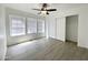 Bedroom with window, ceiling fan, and sliding closet doors with ample natural light at 2333 E Southern Ave # 1101, Tempe, AZ 85282