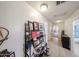 Bright hallway featuring wood floors, a storage rack, and recessed lighting at 23814 W Chambers W St, Buckeye, AZ 85326