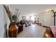 Bright and airy living room showcasing neutral walls and flooring, complemented by comfortable seating and decor at 23814 W Chambers W St, Buckeye, AZ 85326