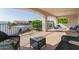 Spacious covered balcony with comfortable seating and neighborhood views at 2438 N Forest Cir, Mesa, AZ 85203