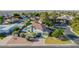 Charming two-story home with a large circular driveway and lush landscaping at 2438 N Forest Cir, Mesa, AZ 85203