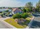 Well-maintained two-story home with a green lawn and mature landscaping at 2438 N Forest Cir, Mesa, AZ 85203