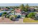 Charming two-story home with a large circular driveway and lush landscaping at 2438 N Forest Cir, Mesa, AZ 85203