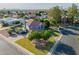 Well-maintained two-story home with a green lawn and mature landscaping at 2438 N Forest Cir, Mesa, AZ 85203