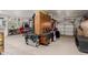 Spacious garage filled with organized storage cabinets and work areas at 2438 N Forest Cir, Mesa, AZ 85203