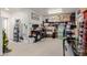 Organized garage interior with shelving, storage, and workspace at 2438 N Forest Cir, Mesa, AZ 85203