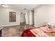 Large bonus room/bedroom with tile flooring, ceiling lights and window at 25212 W Maldonado Dr, Buckeye, AZ 85326
