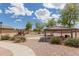 Community park with playground, picnic tables, and walking paths at 25212 W Maldonado Dr, Buckeye, AZ 85326