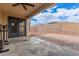 Covered patio with stone flooring and exterior view of the backyard at 25212 W Maldonado Dr, Buckeye, AZ 85326