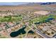 Aerial view showcases a Primary-planned community near a golf course, lake and recreation facilities at 26071 W Sequoia Dr, Buckeye, AZ 85396