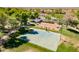 Community park featuring a basketball court, playground, picnic tables, and walking paths at 26071 W Sequoia Dr, Buckeye, AZ 85396