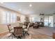 Spacious open layout with living room area adjacent to dining space at 26071 W Sequoia Dr, Buckeye, AZ 85396
