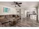 Cozy living room with modern flooring and plenty of natural light at 2643 E Menlo St, Mesa, AZ 85213